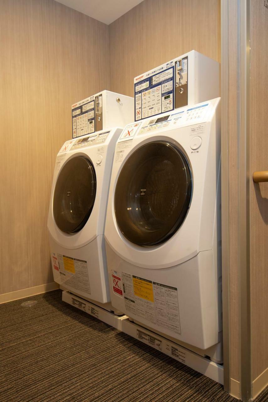 Готель First Cabin Tokyo Dome City Екстер'єр фото